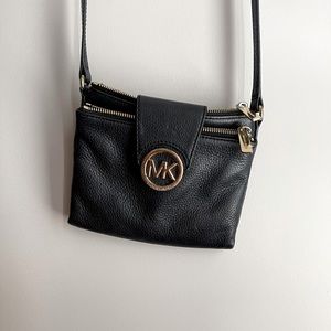 Michael Kors black leather crossbody in good shape.